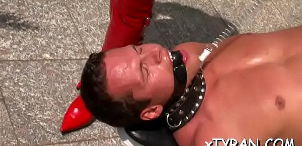  Innocent looking slave made to suck hard schlong while toyed